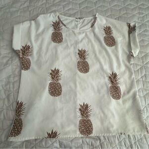 Women’s cream dress shirt with tan pineapples size large. Worn 1-2 times